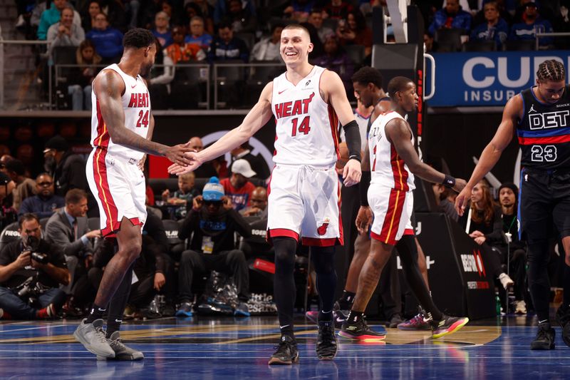 DETROIT, MI - NOOVEMBER 12: Tyler Herro #14 of the Miami Heat smiles against the Detroit Pistons during the Emirates NBA Cup game on November 12, 2024 at Little Caesars Arena in Detroit, Michigan. NOTE TO USER: User expressly acknowledges and agrees that, by downloading and/or using this photograph, User is consenting to the terms and conditions of the Getty Images License Agreement. Mandatory Copyright Notice: Copyright 2024 NBAE (Photo by Brian Sevald/NBAE via Getty Images)