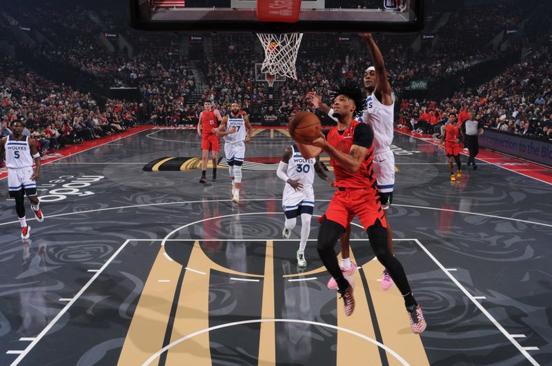 PORTLAND, OR - NOVEMBER 12: Shaedon Sharpe #17 of the Portland Trail Blazers drives to the basket during the game against the Minnesota Timberwolves during the Emirates NBA Cup game on November 12, 2024 at the Moda Center Arena in Portland, Oregon. NOTE TO USER: User expressly acknowledges and agrees that, by downloading and or using this photograph, user is consenting to the terms and conditions of the Getty Images License Agreement. Mandatory Copyright Notice: Copyright 2024 NBAE (Photo by Cameron Browne/NBAE via Getty Images)