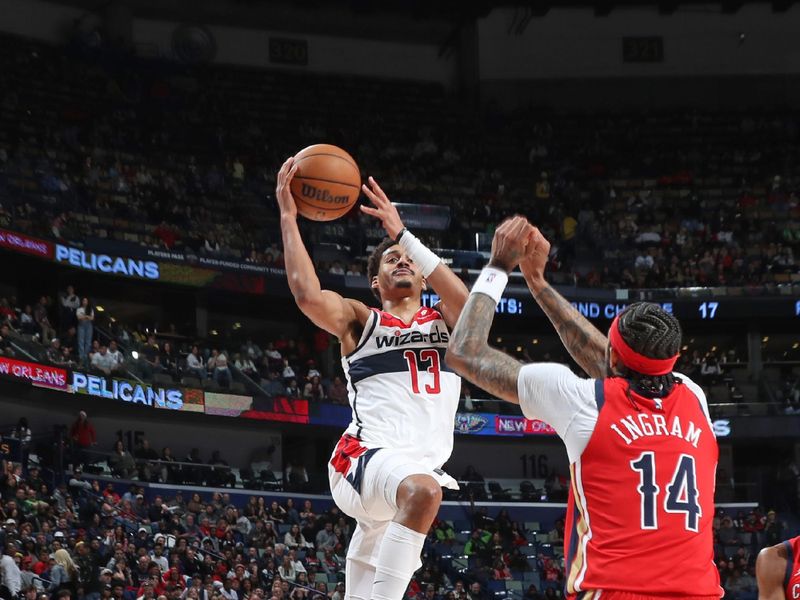 NEW ORLEANS, LA - FEBRUARY 14: Jordan Poole #13 of the Washington Wizards drives to the basket during the game against the New Orleans Pelicans on February 14, 2024 at the Smoothie King Center in New Orleans, Louisiana. NOTE TO USER: User expressly acknowledges and agrees that, by downloading and or using this Photograph, user is consenting to the terms and conditions of the Getty Images License Agreement. Mandatory Copyright Notice: Copyright 2024 NBAE (Photo by Layne Murdoch Jr./NBAE via Getty Images)