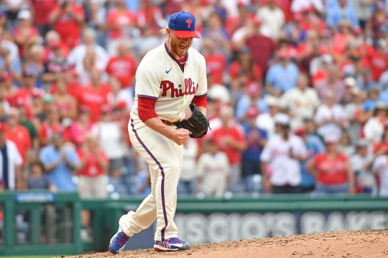 Aug 27, 2023; Philadelphia, Pennsylvania, USA; Philadelphia Phillies relief pitcher Craig Kimbrel (31) reacts after getting the final out during the ninth inning against the St. Louis Cardinals at Citizens Bank Park. Mandatory Credit: Eric Hartline-USA TODAY Sports