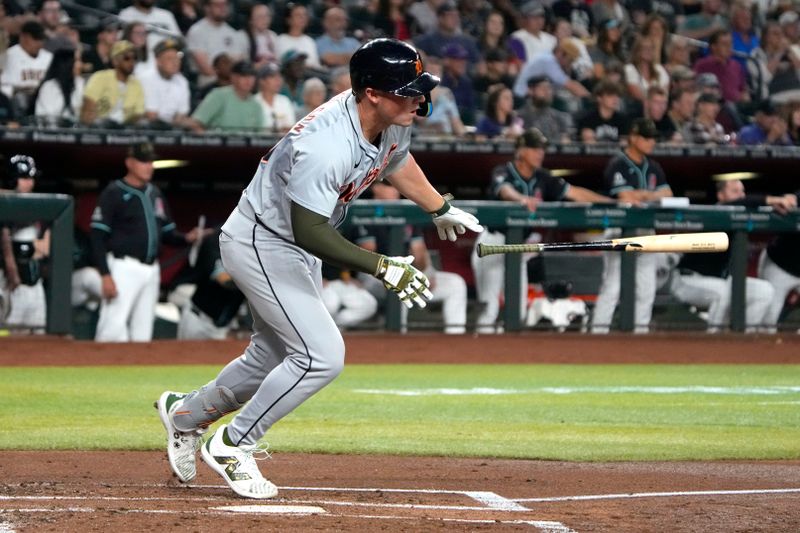 May 17, 2024; Phoenix, Arizona, USA; Detroit Tigers first base Spencer Torkelson (20) hit a single against the Arizona Diamondbacks in the second inning at Chase Field. Mandatory Credit: Rick Scuteri-USA TODAY Sports