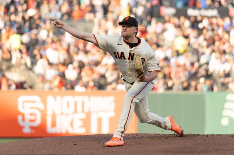 Jul 3, 2023; San Francisco, California, USA;  San Francisco Giants starting pitcher Logan Webb (62) pitches during the first inning against the Seattle Mariners at Oracle Park. Mandatory Credit: Stan Szeto-USA TODAY Sports