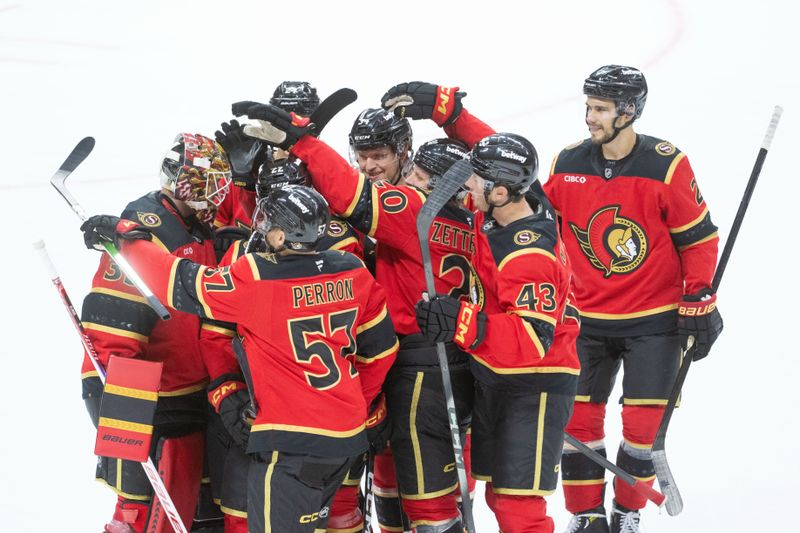 Oct 16, 2025; Ottawa, Ontario, CAN; The Ottawa Senators celebrate their win against the Seattle Kraken in a shootout at the Canadian Tire Centre. Mandatory Credit: Marc DesRosiers-IMAGN Images