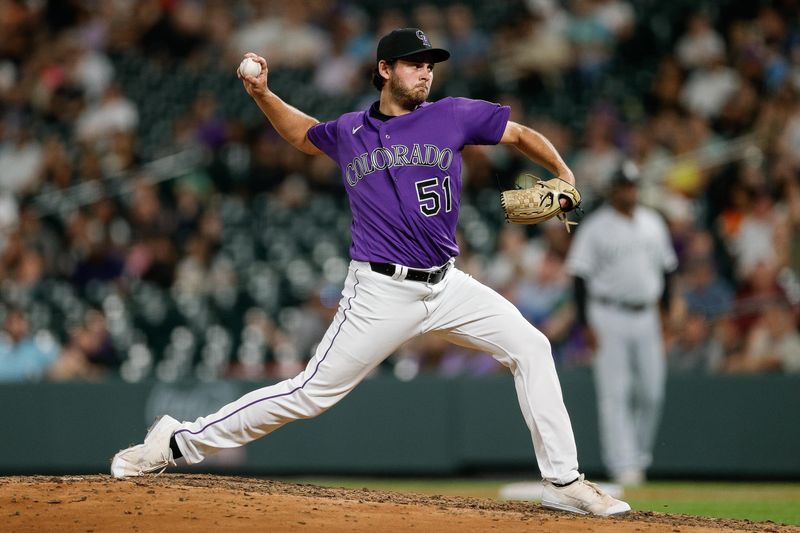 Aug 18, 2023; Denver, Colorado, USA; Colorado Rockies relief pitcher Karl Kauffmann (51) pitches in the ninth inning against the Chicago White Sox at Coors Field. Mandatory Credit: Isaiah J. Downing-USA TODAY Sports