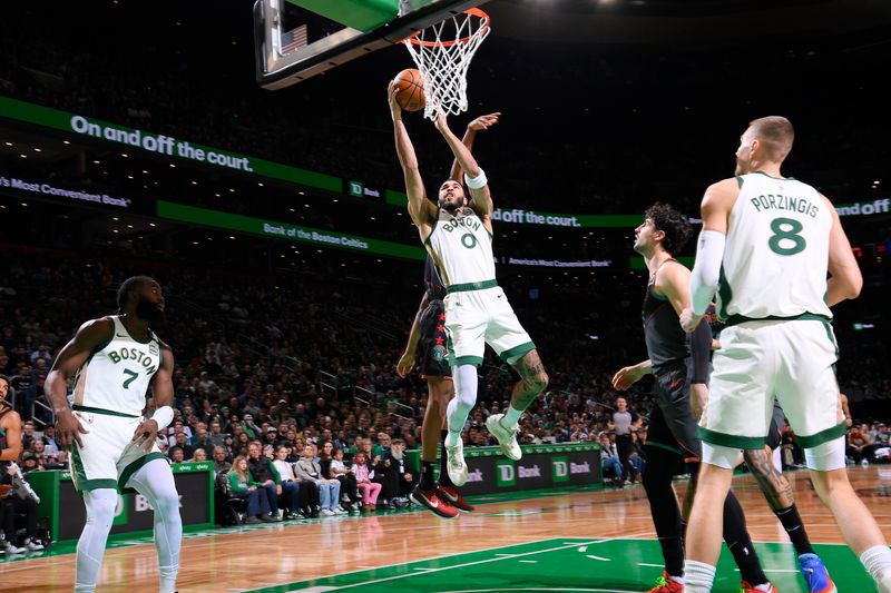 BOSTON, MA - FEBRUARY 9: Jayson Tatum #0 of the Boston Celtics drives to the basket during the game against the Washington Wizards on February 9, 2024 at the TD Garden in Boston, Massachusetts. NOTE TO USER: User expressly acknowledges and agrees that, by downloading and or using this photograph, User is consenting to the terms and conditions of the Getty Images License Agreement. Mandatory Copyright Notice: Copyright 2024 NBAE  (Photo by Brian Babineau/NBAE via Getty Images)