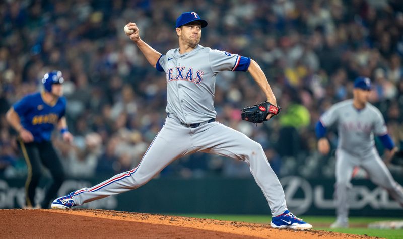 Sep 13, 2024; Seattle, Washington, USA;  Texas Rangers starter Jacob deGrom (48) delivers a pitch during the second inning against the Seattle Mariners at T-Mobile Park. Mandatory Credit: Stephen Brashear-Imagn Images