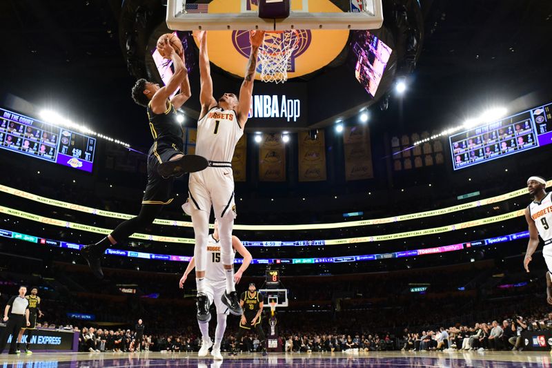 LOS ANGELES, CA - FEBRUARY 8: Max Christie #10 of the Los Angeles Lakers drives to the basket during the game against the Denver Nuggets on February 8, 2024 at Crypto.Com Arena in Los Angeles, California. NOTE TO USER: User expressly acknowledges and agrees that, by downloading and/or using this Photograph, user is consenting to the terms and conditions of the Getty Images License Agreement. Mandatory Copyright Notice: Copyright 2024 NBAE (Photo by Adam Pantozzi/NBAE via Getty Images)