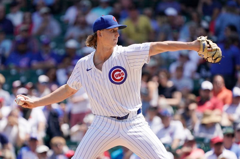 May 23, 2024; Chicago, Illinois, USA; Chicago Cubs pitcher Ben Brown (32) pitches against the Atlanta Braves during the first inning at Wrigley Field. Mandatory Credit: David Banks-USA TODAY Sports