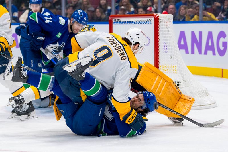 Nov 17, 2024; Vancouver, British Columbia, CAN; Nashville Predators forward Filip Forsberg (9) checks Vancouver Canucks forward Kiefer Sherwood (44) during the third period at Rogers Arena. Mandatory Credit: Bob Frid-Imagn Images