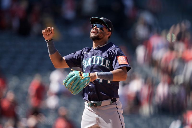 Jun 8, 2025; Anaheim, California, USA; Seattle Mariners center fielder Julio Rodriguez (44) celebrates at the end of a game against the Los Angeles Angels at Angel Stadium. Mandatory Credit: Kirby Lee-Imagn Images