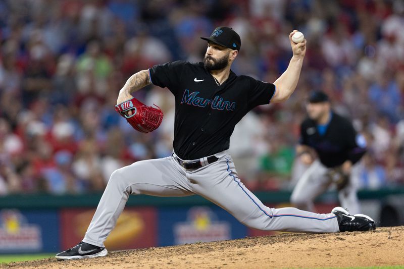 Sep 8, 2023; Philadelphia, Pennsylvania, USA; Miami Marlins relief pitcher Tanner Scott (66) throws a pitch during the ninth inning against the Philadelphia Phillies at Citizens Bank Park. Mandatory Credit: Bill Streicher-USA TODAY Sports