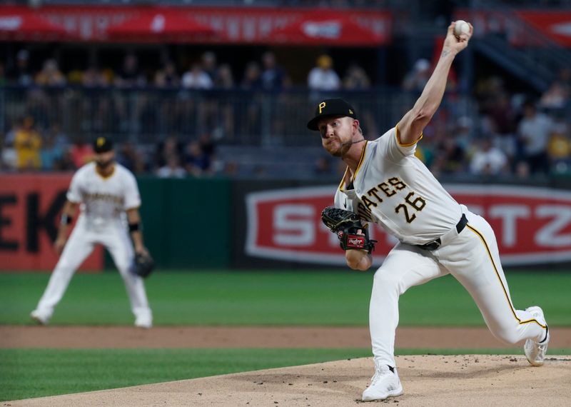 Aug 6, 2024; Pittsburgh, Pennsylvania, USA;  Pittsburgh Pirates starting pitcher Bailey Falter (26) delivers a pitch against the San Diego Padres during the first inning at PNC Park. Mandatory Credit: Charles LeClaire-USA TODAY Sports