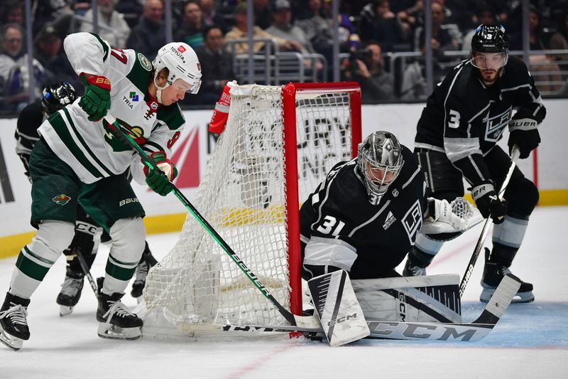 Mar 20, 2024; Los Angeles, California, USA; Minnesota Wild left wing Kirill Kaprizov (97) moves in for a shot on goal against Los Angeles Kings goaltender David Rittich (31) during the third period at Crypto.com Arena. Mandatory Credit: Gary A. Vasquez-USA TODAY Sports