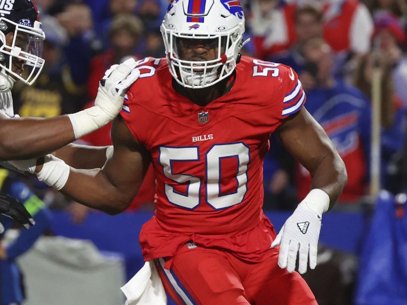 Buffalo Bills defensive end Greg Rousseau (50) pressures a lineman during the first half of an NFL football game against the New York Giants in Orchard Park, N.Y., Sunday Oct. 15, 2023. (AP Photo/ Jeffrey T. Barnes)