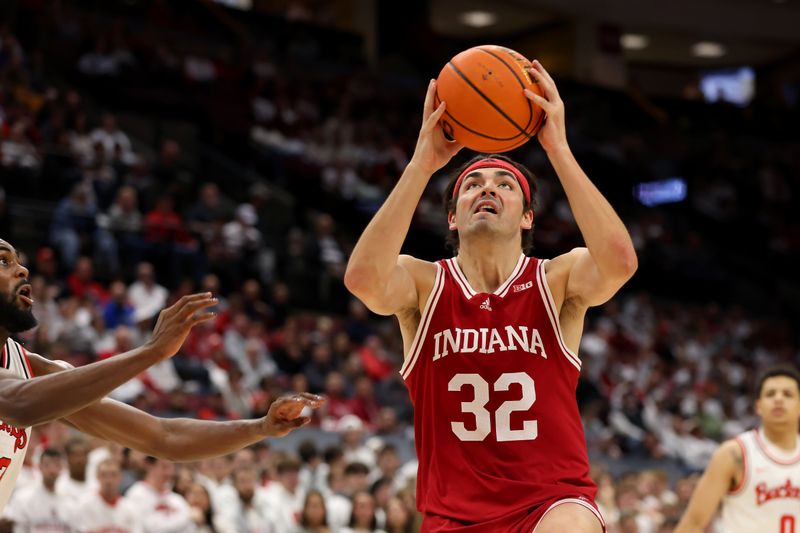 Jan 17, 2025; Columbus, Ohio, USA; Indiana Hoosiers guard Trey Galloway (32) takes the ball to the basket during the first half against the Ohio State Buckeyes at Value City Arena. Mandatory Credit: Joseph Maiorana-Imagn Images