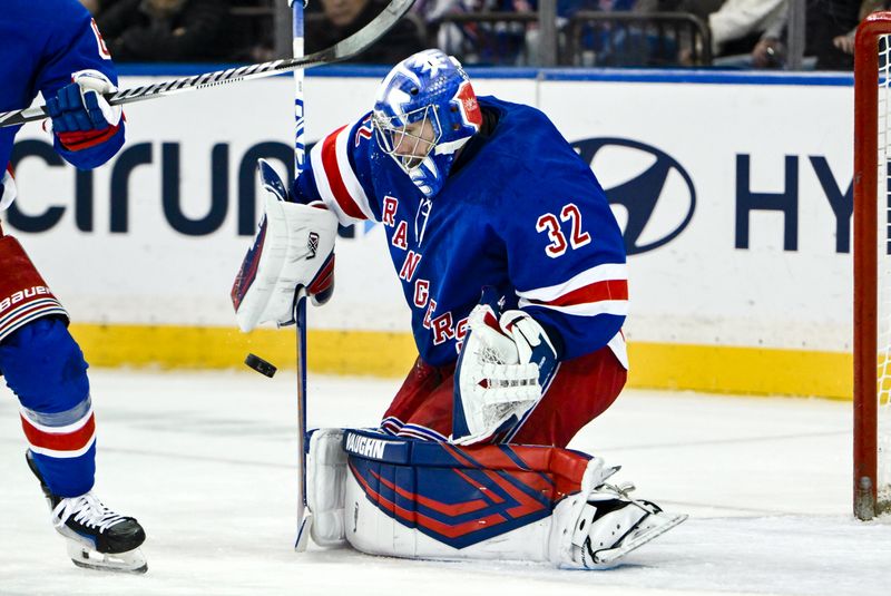 Nov 30, 2024; New York, New York, USA; New York Rangers goaltender Jonathan Quick (32) makes a save against the Montreal Canadiens during the second period at Madison Square Garden. Mandatory Credit: John Jones-Imagn Images