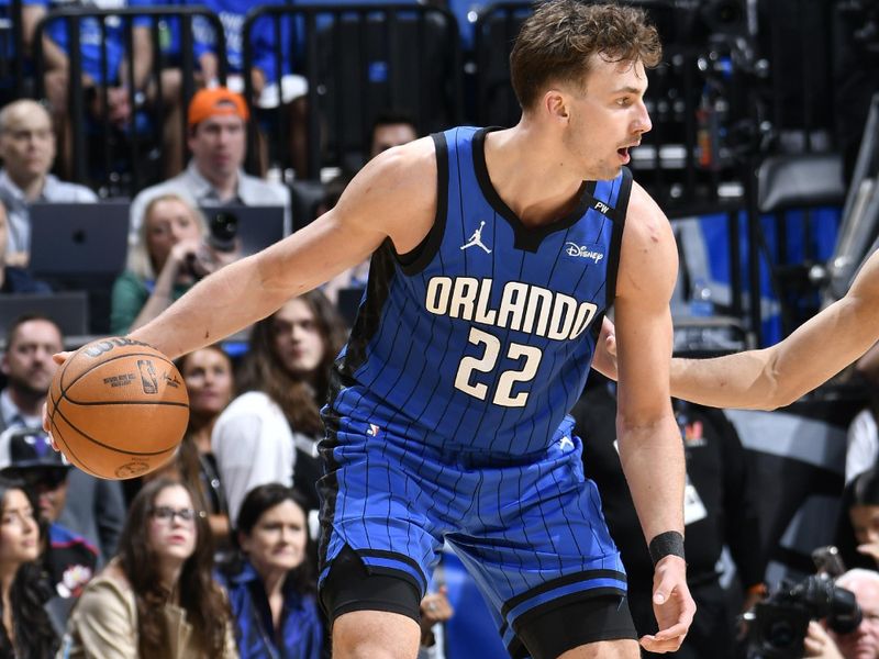 ORLANDO, FL - APRIL 27: Franz Wagner #22 of the Orlando Magic dribbles the ball during the game against the Boston Celtics   during Round 1 Game 4 of the 2025 NBA Playoffs on April 27, 2025 at Kia Center in Orlando, Florida. NOTE TO USER: User expressly acknowledges and agrees that, by downloading and or using this photograph, User is consenting to the terms and conditions of the Getty Images License Agreement. Mandatory Copyright Notice: Copyright 2025 NBAE (Photo by Fernando Medina/NBAE via Getty Images)