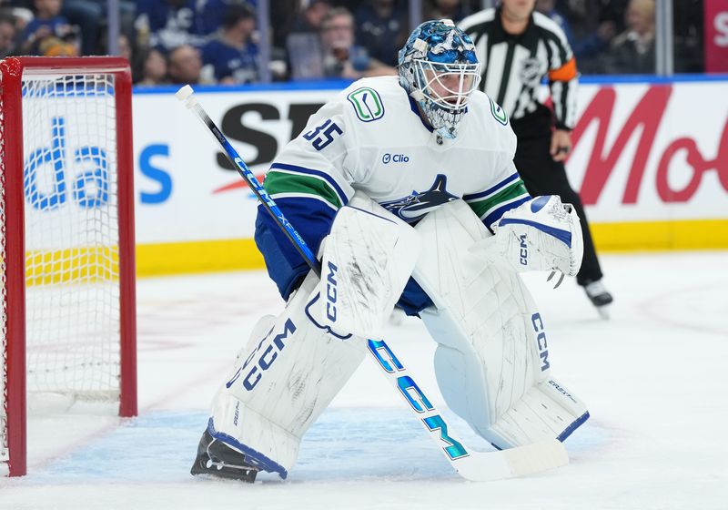 Jan 10, 2026; Toronto, Ontario, CAN; Vancouver Canucks goaltender Thatcher Demko (35) waits for the faceoff against the Toronto Maple Leafs during the first period at Scotiabank Arena. Mandatory Credit: Nick Turchiaro-Imagn Images