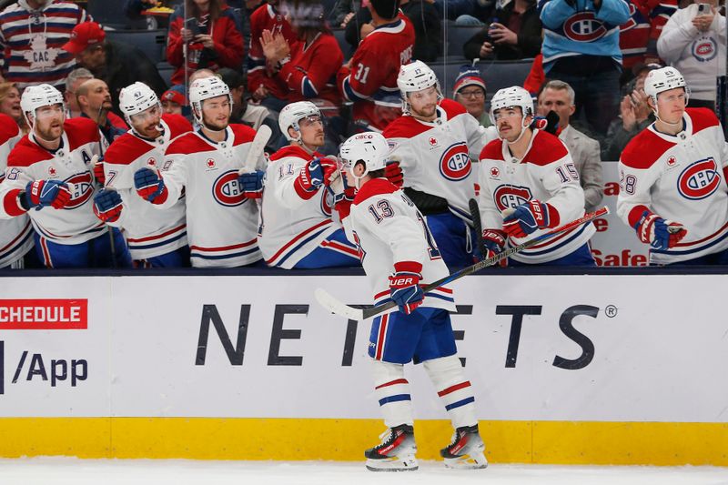 Nov 27, 2024; Columbus, Ohio, USA; Montreal Canadiens right wing  Cole Caufield (13) celebrates his goal against the Columbus Blue Jackets during the second period at Nationwide Arena. Mandatory Credit: Russell LaBounty-Imagn Images