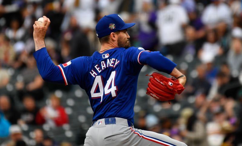 May 11, 2024; Denver, Colorado, USA; Texas Rangers pitcher Andrew Heaney (44) delivers against the Colorado Rockies during the first inning at Coors Field. Mandatory Credit: John Leyba-USA TODAY Sports