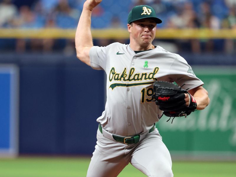 May 30, 2024; St. Petersburg, Florida, USA; Oakland Athletics relief pitcher Mason Miller (19) throws a pitch against the Tampa Bay Rays during the ninth inning at Tropicana Field. Mandatory Credit: Kim Klement Neitzel-USA TODAY Sports