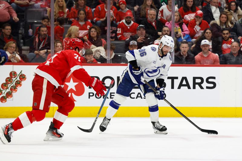 Jan 25, 2025; Detroit, Michigan, USA;  Tampa Bay Lightning right wing Nikita Kucherov (86) skates with the puck in the third period against the Detroit Red Wings at Little Caesars Arena. Mandatory Credit: Rick Osentoski-Imagn Images