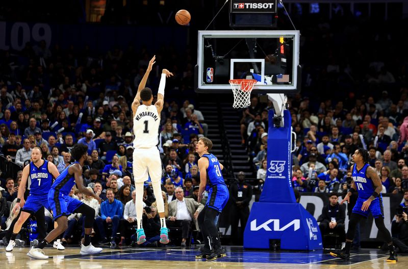 ORLANDO, FLORIDA - FEBRUARY 08: Victor Wembanyama #1 of the San Antonio Spurs shoots during a game against the Orlando Magic at Kia Center on February 08, 2024 in Orlando, Florida. (Photo by Mike Ehrmann/Getty Images) NOTE TO USER: User expressly acknowledges and agrees that, by downloading and or using this photograph, User is consenting to the terms and conditions of the Getty Images License Agreement. (Photo by Mike Ehrmann/Getty Images)