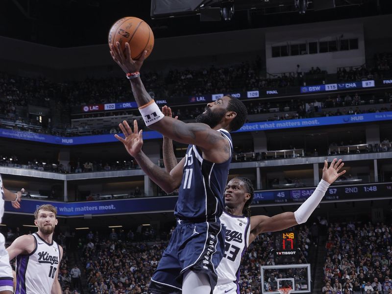 SACRAMENTO, CA - MARCH 29:  Kyrie Irving #11 of the Dallas Mavericks goes to the basket during the game on March 29, 2024 at Golden 1 Center in Sacramento, California. NOTE TO USER: User expressly acknowledges and agrees that, by downloading and or using this Photograph, user is consenting to the terms and conditions of the Getty Images License Agreement. Mandatory Copyright Notice: Copyright 2024 NBAE (Photo by Rocky Widner/NBAE via Getty Images)