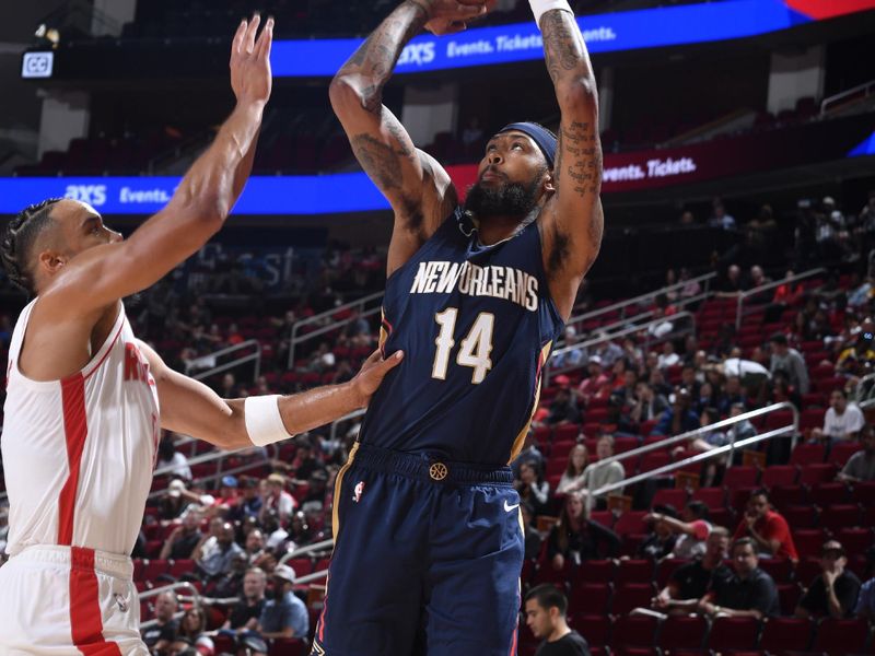 HOUSTON, TX - OCTOBER 15: Brandon Ingram #14 of the New Orleans Pelicans shoots a three point basket during the game against the Houston Rockets during a NBA preseason game on October 15, 2024 at the Toyota Center in Houston, Texas. NOTE TO USER: User expressly acknowledges and agrees that, by downloading and or using this photograph, User is consenting to the terms and conditions of the Getty Images License Agreement. Mandatory Copyright Notice: Copyright 2024 NBAE (Photo by Logan Riely/NBAE via Getty Images)