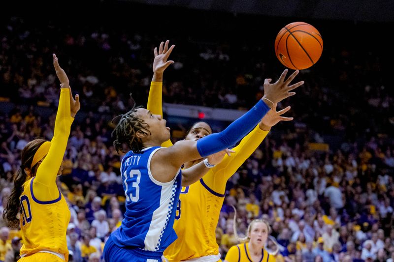 Mar 3, 2024; Baton Rouge, Louisiana, USA;  Kentucky Wildcats forward Ajae Petty (13) shoots against LSU Lady Tigers center Aalyah Del Rosario (23) during the second half at Pete Maravich Assembly Center. Mandatory Credit: Matthew Hinton-USA TODAY Sports
