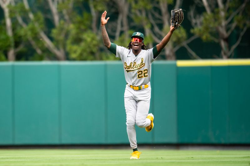 Oct 1, 2023; Anaheim, California, USA; Oakland Athletics center fielder Lawrence Butler (22) celebrates after making a catch against the Los Angeles Angels during the third inning at Angel Stadium. Mandatory Credit: Jonathan Hui-USA TODAY Sports