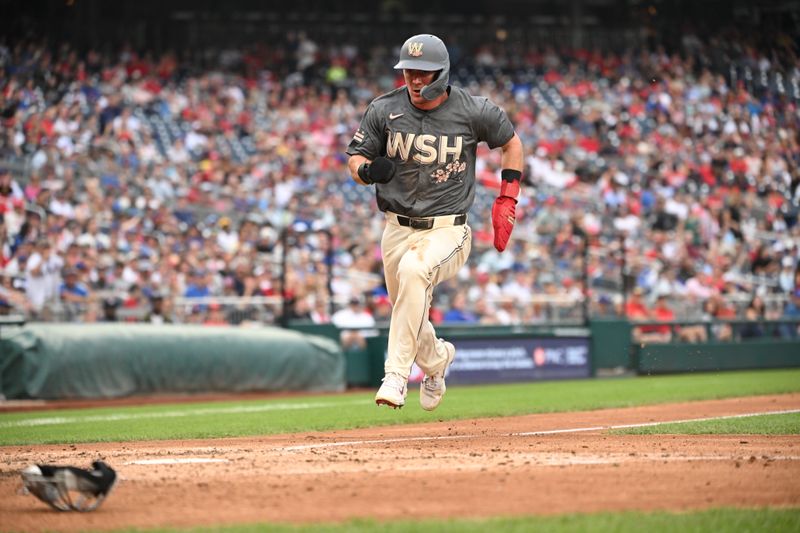 Aug 31, 2024; Washington, District of Columbia, USA; Washington Nationals center fielder Jacob Young (30) scores a run against the Chicago Cubs during the fifth inning at Nationals Park. Mandatory Credit: Rafael Suanes-USA TODAY Sports