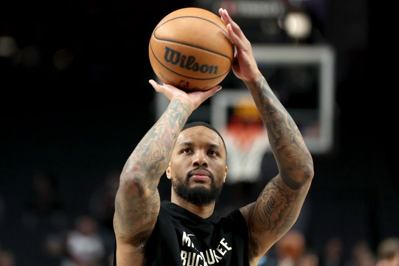 PORTLAND, OREGON - JANUARY 31: Damian Lillard #0 of the Milwaukee Bucks warms up before his return against the Portland Trail Blazers at Moda Center on January 31, 2024 in Portland, Oregon. (Photo by Steph Chambers/Getty Images)