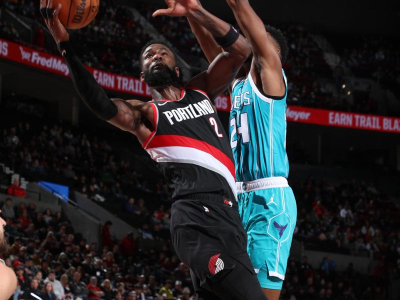 PORTLAND, OR - FEBRUARY 25:  Deandre Ayton #2 of the Portland Trail Blazers goes to the basket during the game on February 25, 2024 at the Moda Center Arena in Portland, Oregon. NOTE TO USER: User expressly acknowledges and agrees that, by downloading and or using this photograph, user is consenting to the terms and conditions of the Getty Images License Agreement. Mandatory Copyright Notice: Copyright 2024 NBAE (Photo by Cameron Browne/NBAE via Getty Images)