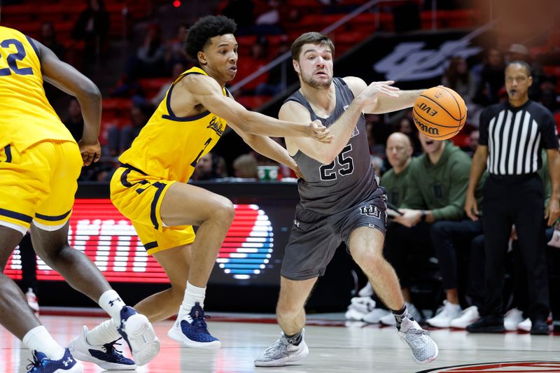 Feb 5, 2023; Salt Lake City, Utah, USA; Utah Utes guard Rollie Worster (25) drives against California Golden Bears forward Monty Bowser (2) in the second half at Jon M. Huntsman Center. Mandatory Credit: Jeffrey Swinger-USA TODAY Sports