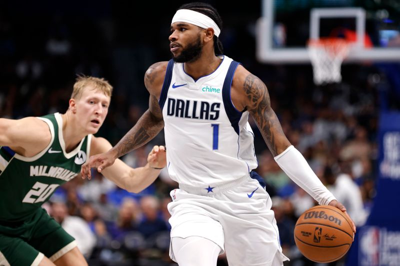 DALLAS, TX -OCTOBER 17 : Jaden Hardy #1 of the Dallas Mavericks handles the ball against the Milwaukee Bucks in the second half of an NBA preseason game at American Airlines Center on October 17, 2024 in Dallas, Texas. NOTE TO USER: User expressly acknowledges and agrees that, by downloading and or using this photograph, User is consenting to the terms and conditions of the Getty Images License Agreement. (Photo by Ron Jenkins/Getty Images)