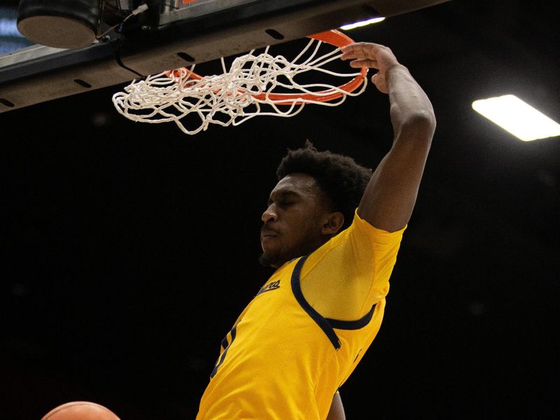 Jan 28, 2023; Stanford, California, USA; California Golden Bears guard Marsalis Roberson (0) dunks against the Stanford Cardinal during the second half at Maples Pavilion. Stanford defeated California 75-46. Mandatory Credit: D. Ross Cameron-USA TODAY Sports