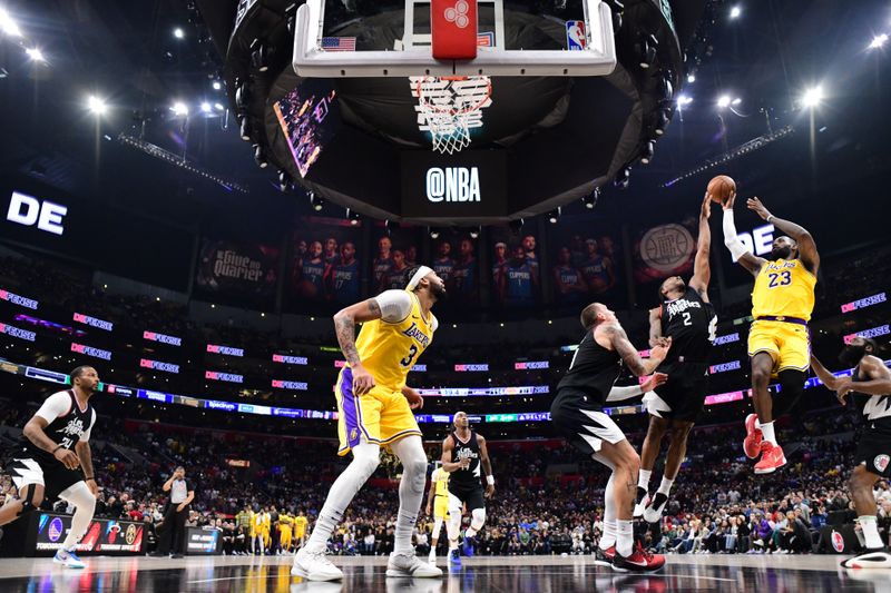 LOS ANGELES, CA - FEBRUARY 28:  LeBron James #23 of the Los Angeles Lakers shoots the ball during the game  on February 28, 2024 at Crypto.Com Arena in Los Angeles, California. NOTE TO USER: User expressly acknowledges and agrees that, by downloading and/or using this Photograph, user is consenting to the terms and conditions of the Getty Images License Agreement. Mandatory Copyright Notice: Copyright 2024 NBAE (Photo by Adam Pantozzi/NBAE via Getty Images)