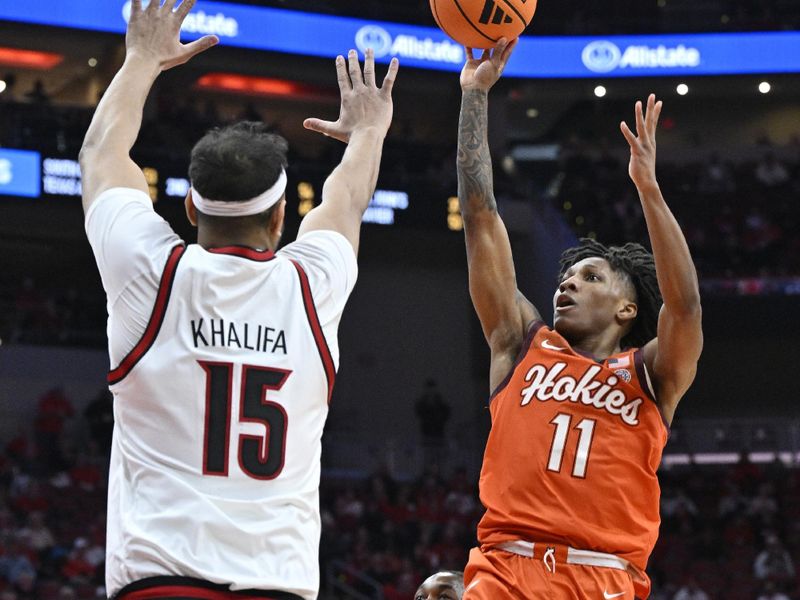 Jan 24, 2026; Louisville, Kentucky, USA;  Virginia Tech Hokies guard Ben Hammond (11) shoots against Louisville Cardinals center Aly Khalifa (15) during the first half at KFC Yum! Center. Mandatory Credit: Jamie Rhodes-Imagn Images
