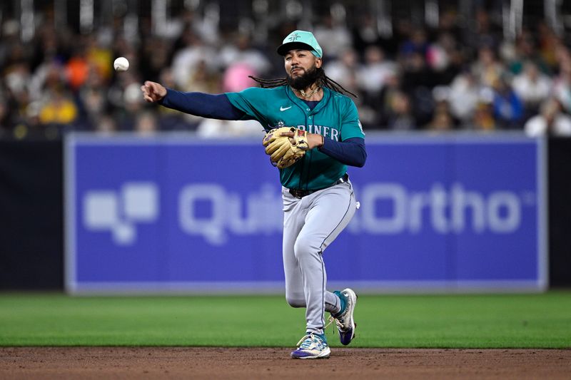 Mar 25, 2024; San Diego, California, USA; Seattle Mariners shortstop J.P. Crawford (3) throws to first base on a ground out by San Diego Padres left fielder Jurickson Profar (not pictured) during the second inning at Petco Park. Mandatory Credit: Orlando Ramirez-USA TODAY Sports