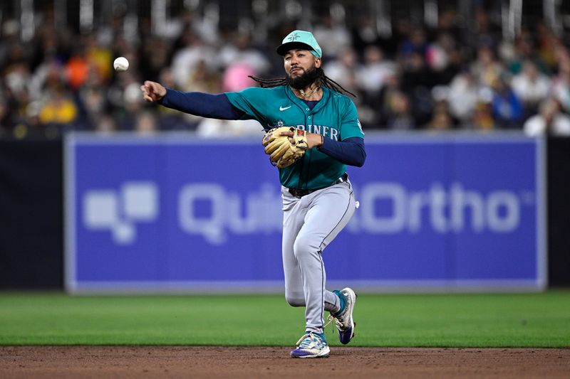 Mar 25, 2024; San Diego, California, USA; Seattle Mariners shortstop J.P. Crawford (3) throws to first base on a ground out by San Diego Padres left fielder Jurickson Profar (not pictured) during the second inning at Petco Park. Mandatory Credit: Orlando Ramirez-USA TODAY Sports