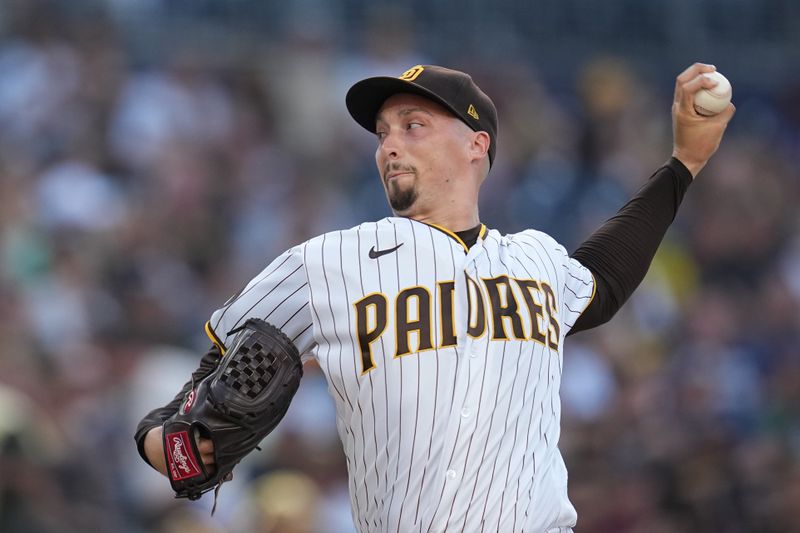 Jul 25, 2023; San Diego, California, USA; San Diego Padres starting pitcher Blake Snell (4) throws a pitch against against the Pittsburgh Pirates during the first inning at Petco Park. Mandatory Credit: Ray Acevedo-USA TODAY Sports