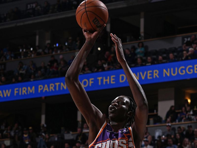 DENVER, CO - OCTOBER 13: Bol Bol #11 of the Phoenix Suns drives to the basket during the game against the Denver Nuggets on October 13, 2024 at Ball Arena in Denver, Colorado. NOTE TO USER: User expressly acknowledges and agrees that, by downloading and/or using this Photograph, user is consenting to the terms and conditions of the Getty Images License Agreement. Mandatory Copyright Notice: Copyright 2024 NBAE (Photo by Bart Young/NBAE via Getty Images)