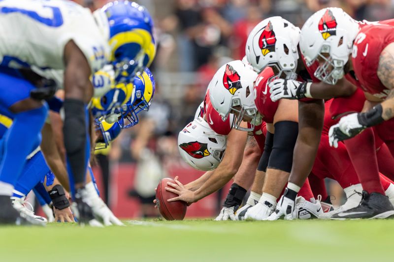 The Arizona Cardinals line up against the Los Angeles Rams in an NFL football game, Sunday, Sept. 15, 2024, in Glendale, Ariz. (AP Photo/Jeff Lewis)