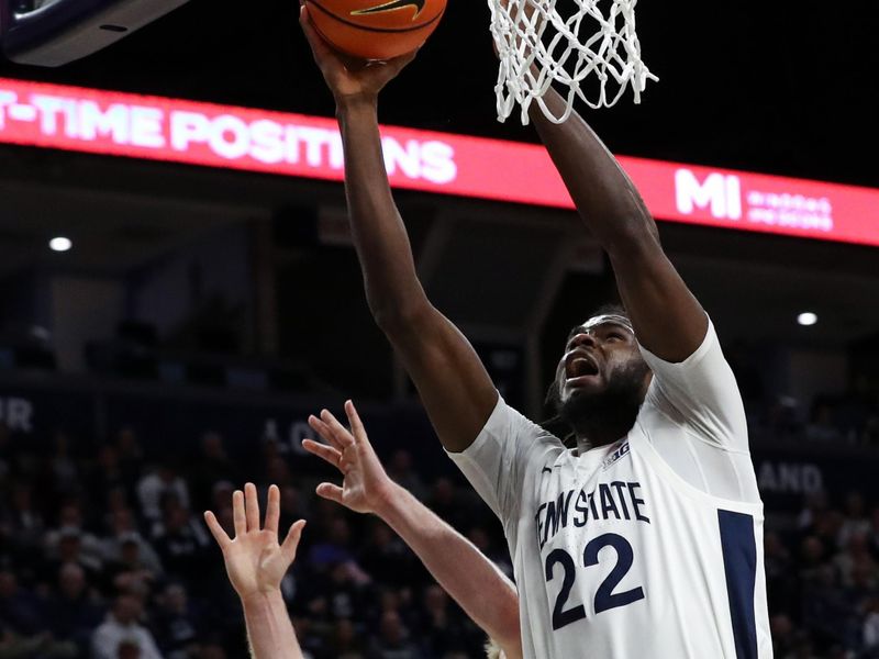 Feb 8, 2024; University Park, Pennsylvania, USA; Penn State Nittany Lions forward Qudus Wahab (22) reaches for the rebound during the first half against the Iowa Hawkeyes at Bryce Jordan Center. Penn State defeated Iowa 89-79. Mandatory Credit: Matthew O'Haren-USA TODAY Sports