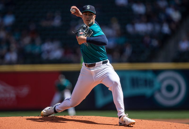 May 15, 2024; Seattle, Washington, USA; Seattle Mariners starter Bryan Woo (22) delivers a pitch during the first inning against the Kansas City Royals at T-Mobile Park. Mandatory Credit: Stephen Brashear-USA TODAY Sports