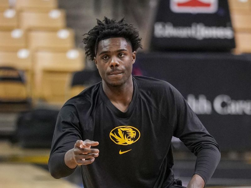 Mar 4, 2023; Columbia, Missouri, USA; Missouri Tigers guard Kobe Brown (24) stretches against the Mississippi Rebels prior to a game at Mizzou Arena. Mandatory Credit: Denny Medley-USA TODAY Sports