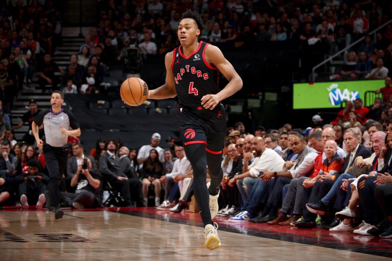 TORONTO, CANADA - APRIL 12: Scottie Barnes #4 of the Toronto Raptors dribbles the ball during the game against the Chicago Bulls during the 2023 Play-In Tournament on April 12, 2023 at the Scotiabank Arena in Toronto, Ontario, Canada.  NOTE TO USER: User expressly acknowledges and agrees that, by downloading and or using this Photograph, user is consenting to the terms and conditions of the Getty Images License Agreement.  Mandatory Copyright Notice: Copyright 2023 NBAE (Photo by Vaughn Ridley/NBAE via Getty Images)