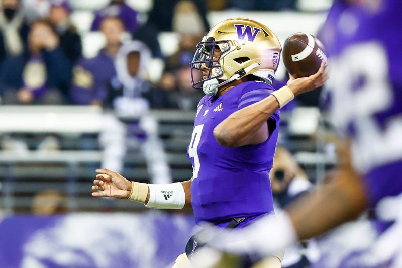 Nov 19, 2022; Seattle, Washington, USA; Washington Huskies quarterback Michael Penix Jr. (9) passes against the Colorado Buffaloes during the second quarter at Alaska Airlines Field at Husky Stadium. Mandatory Credit: Joe Nicholson-USA TODAY Sports