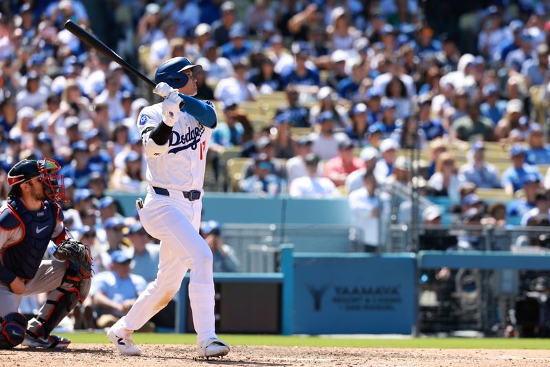 May 5, 2024; Los Angeles, California, USA;  Los Angeles Dodgers designated hitter Shohei Ohtani (17) hits a home run during the eighth inning against the Atlanta Braves at Dodger Stadium. Mandatory Credit: Kiyoshi Mio-USA TODAY Sports